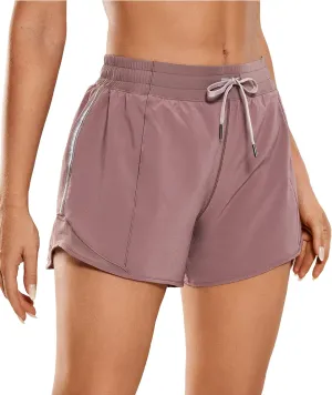 CRZ YOGA Womens Athletic Running Shorts with Zip Pocket, 4" Mid-Waist Mesh Liner Gym Workout Shorts