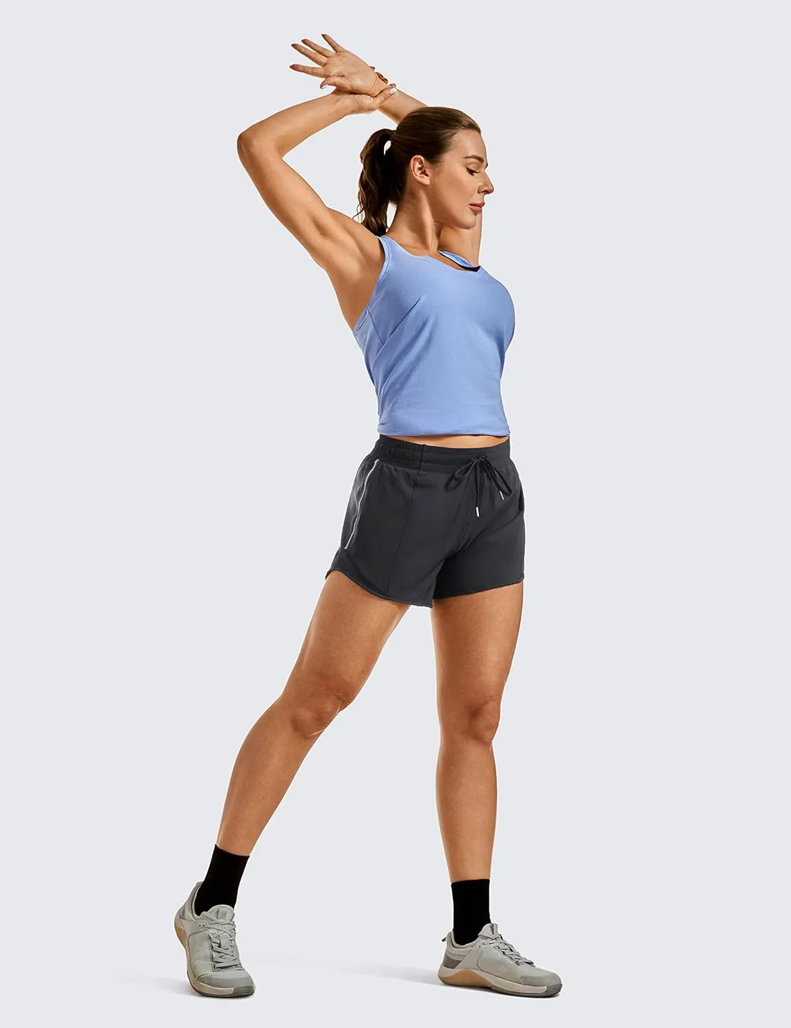CRZ YOGA Womens Athletic Running Shorts with Zip Pocket, 4" Mid-Waist Mesh Liner Gym Workout Shorts