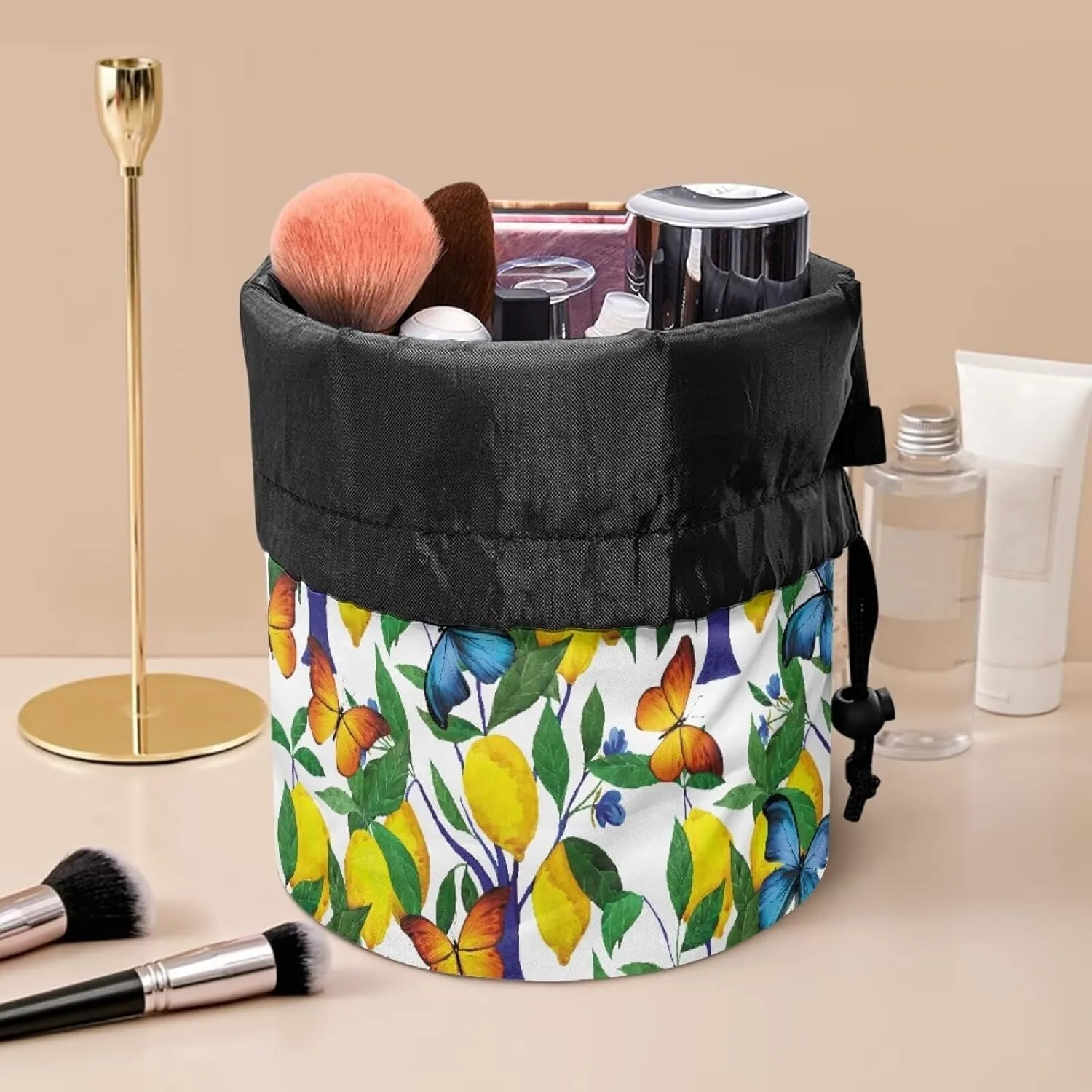 Lemon and Butterfly drawstring makeup bag opens flat lay and go makeup bag with drawstring makeup travel organizer barrel drawstring makeup bag travel essentials for women travel makeup bag
